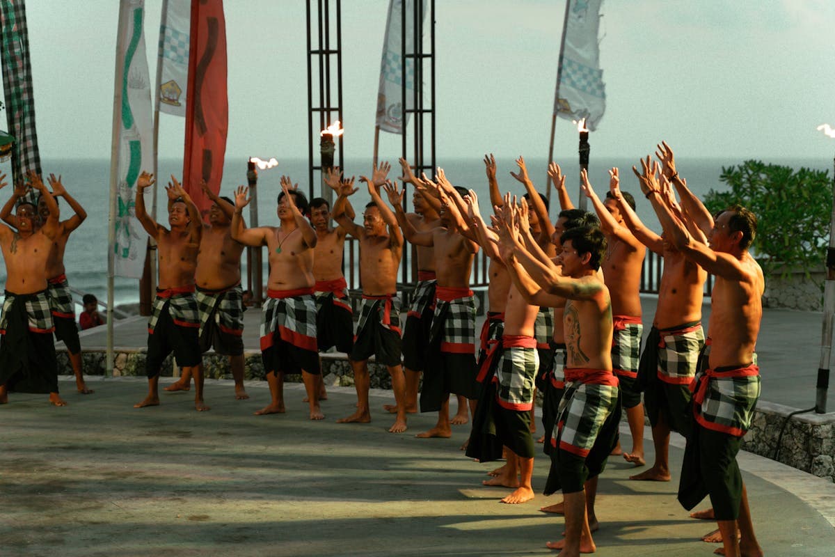 Kecak Dance at Uluwatu, 100 performers in the fire circle with the Indian Ocean as backdrop, the defining moment of any Bali honeymoon