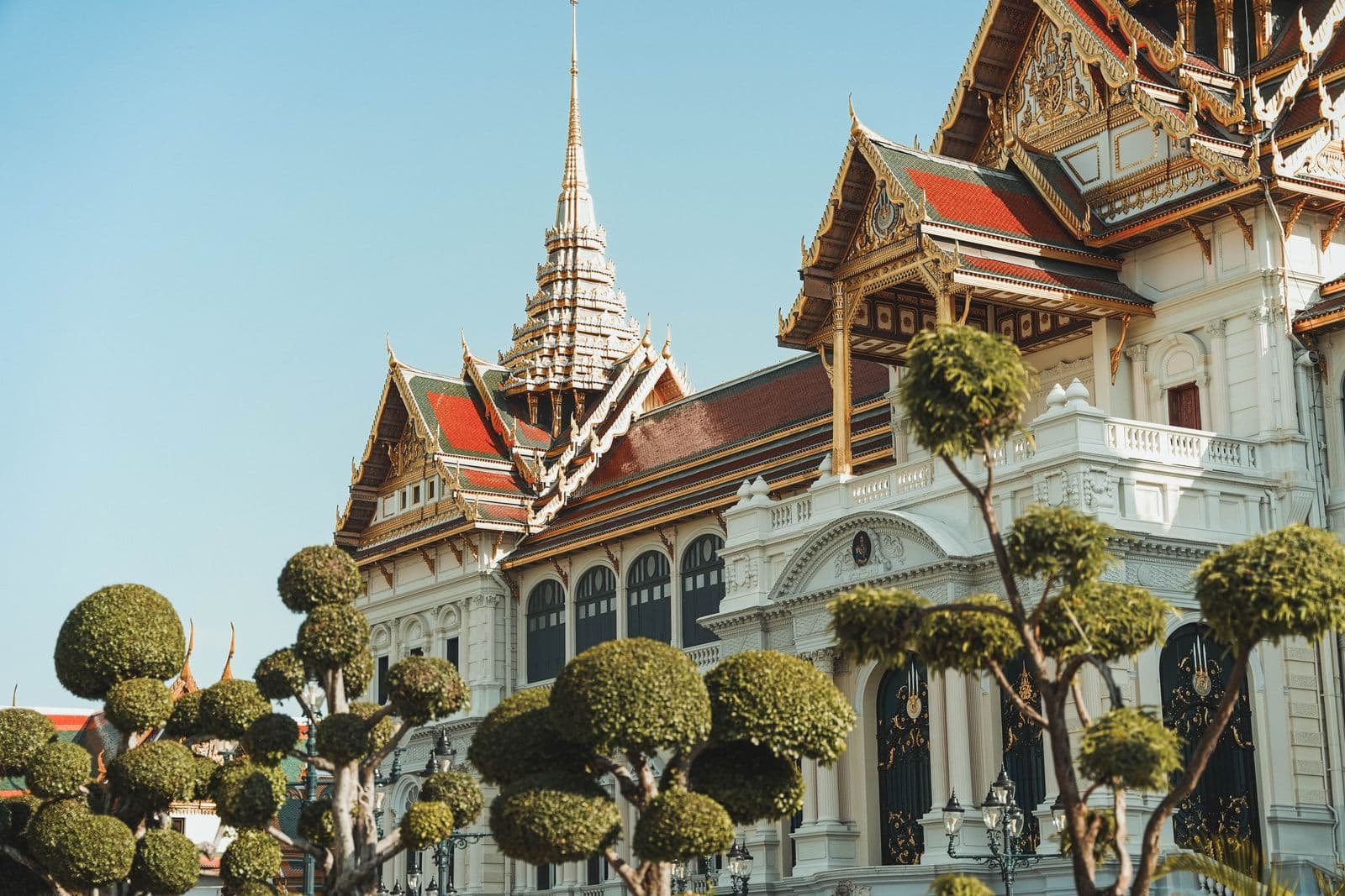 The Chakri Maha Prasat hall and topiary gardens at Bangkok's Grand Palace