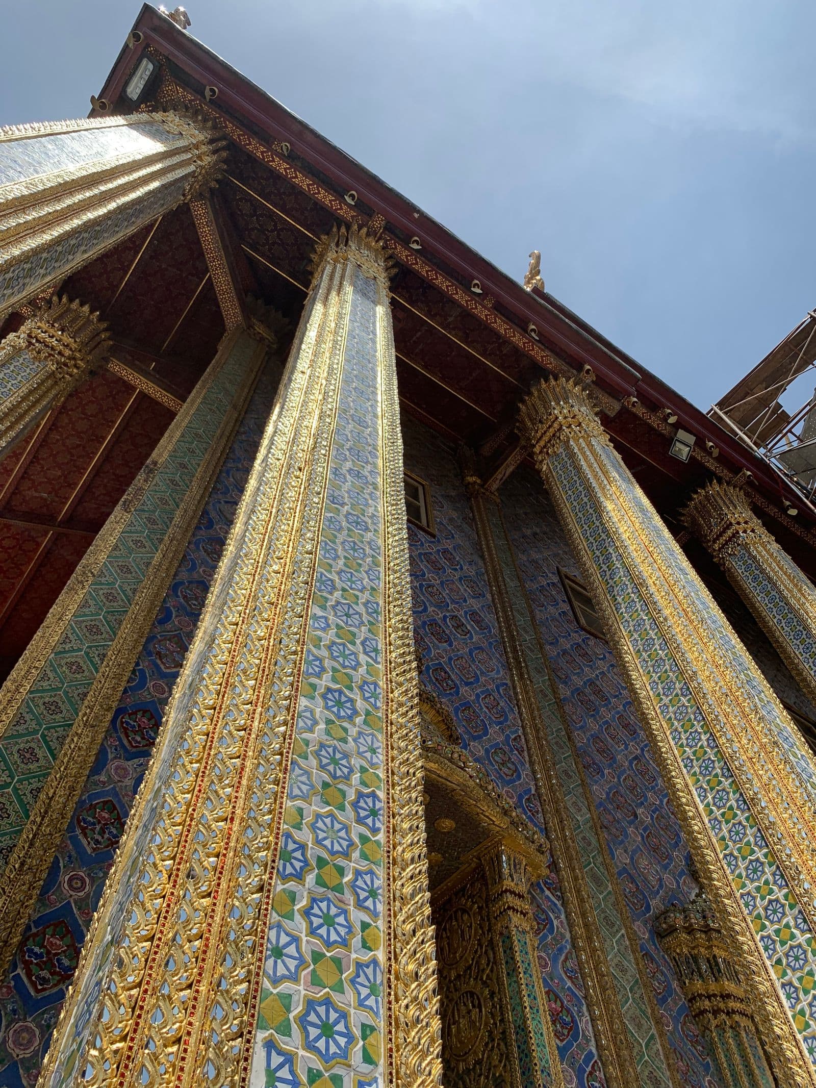 Gilded mosaic columns of a hall at Wat Phra Kaew