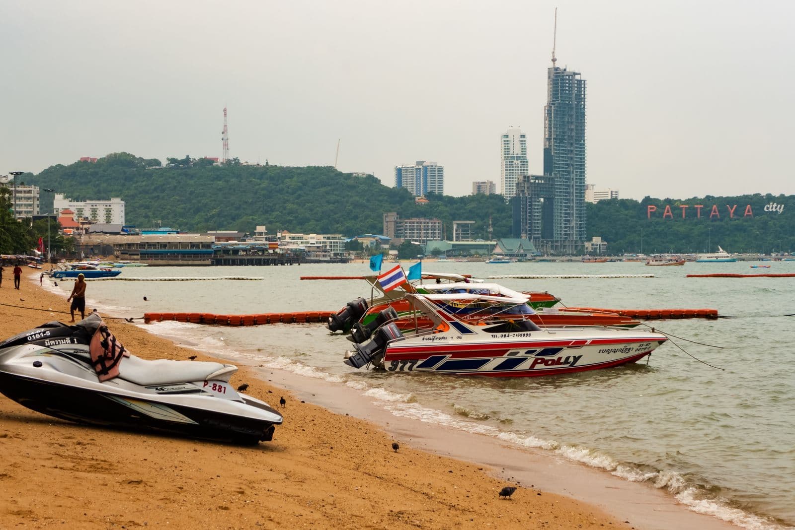 Pattaya Beach shoreline with the PATTAYA CITY sign in view