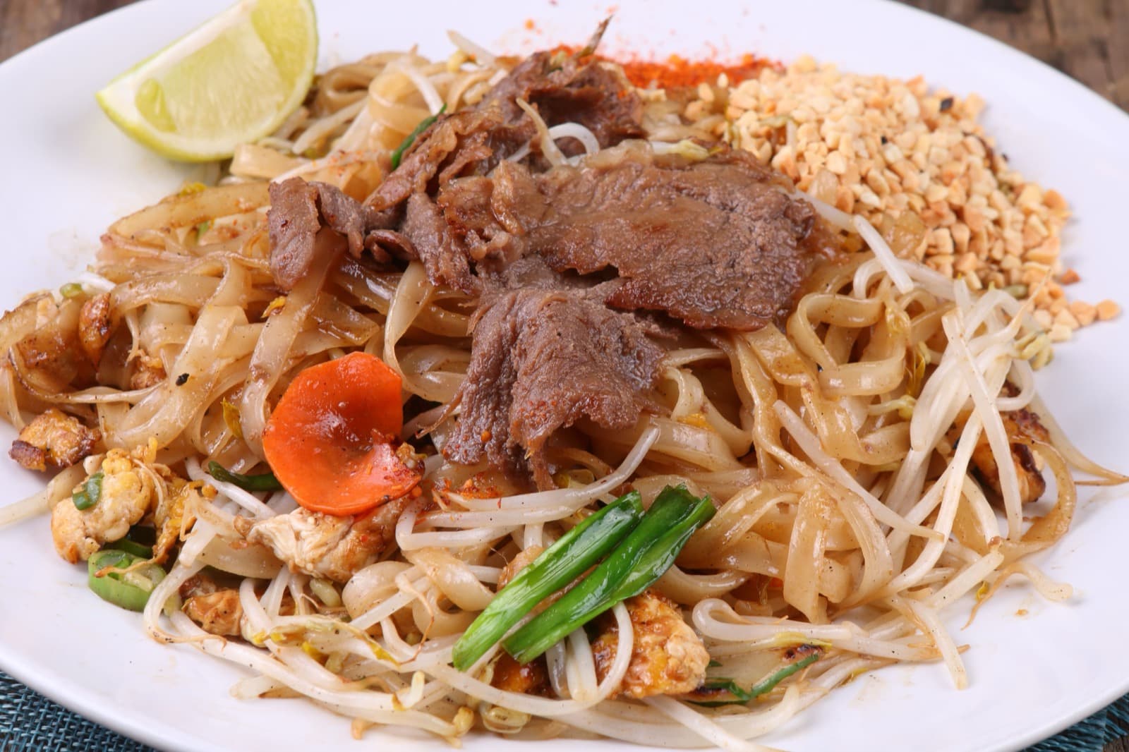 A plate of pad thai you cooked yourself