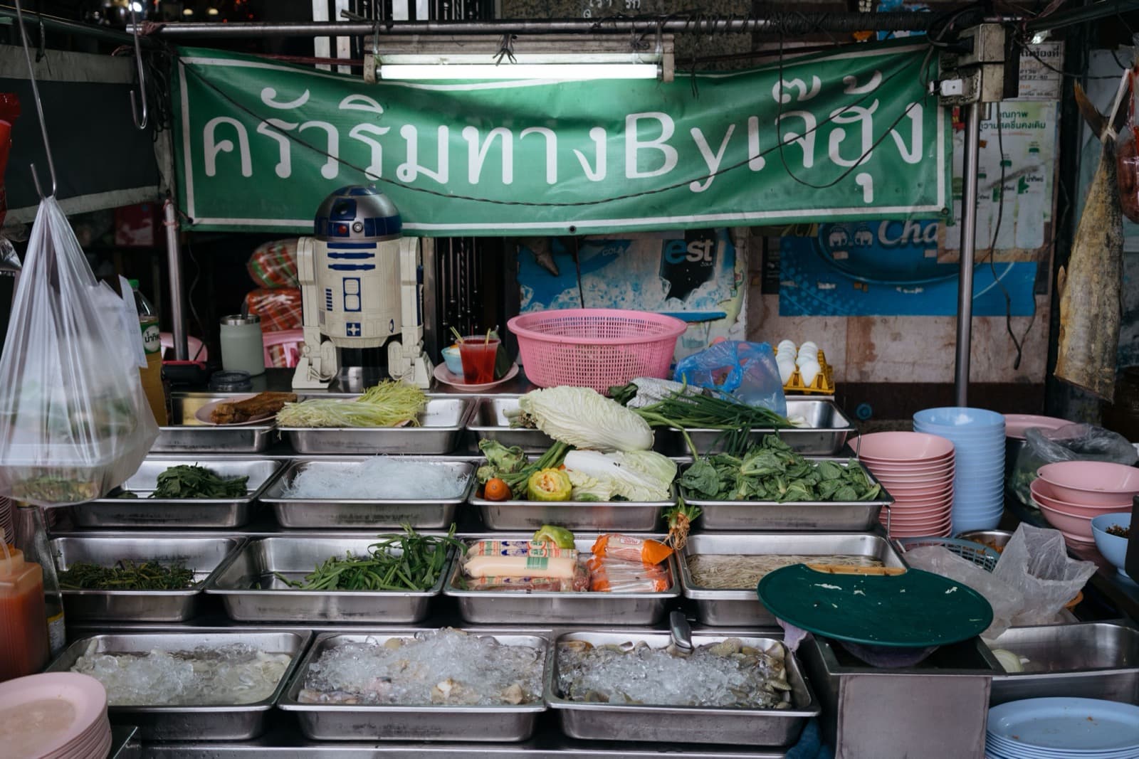 Fresh vegetables and aromatic ingredients at a Thai market