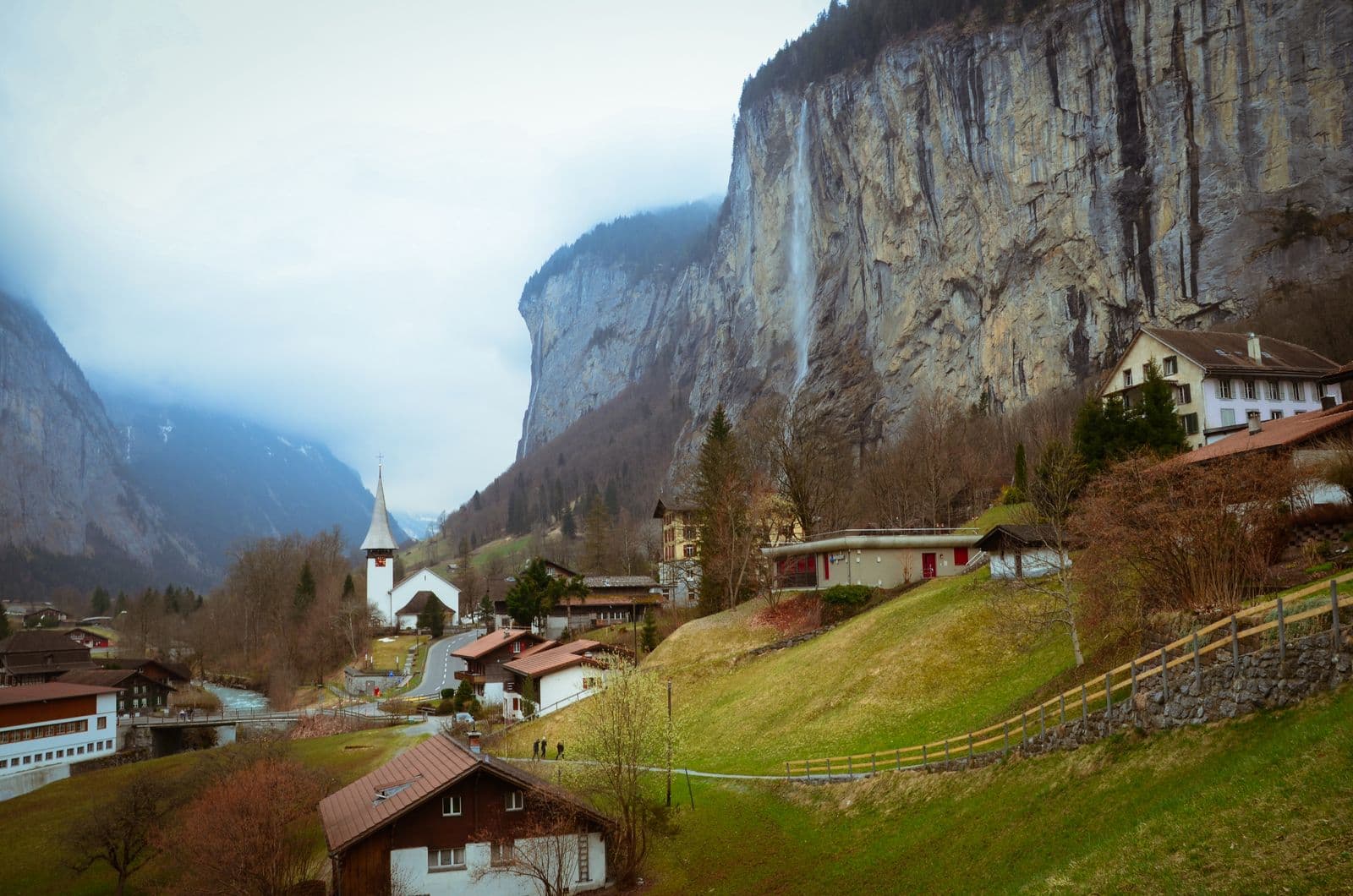 Lauterbrunnen valley village and Staubbach Falls dropping off the cliff