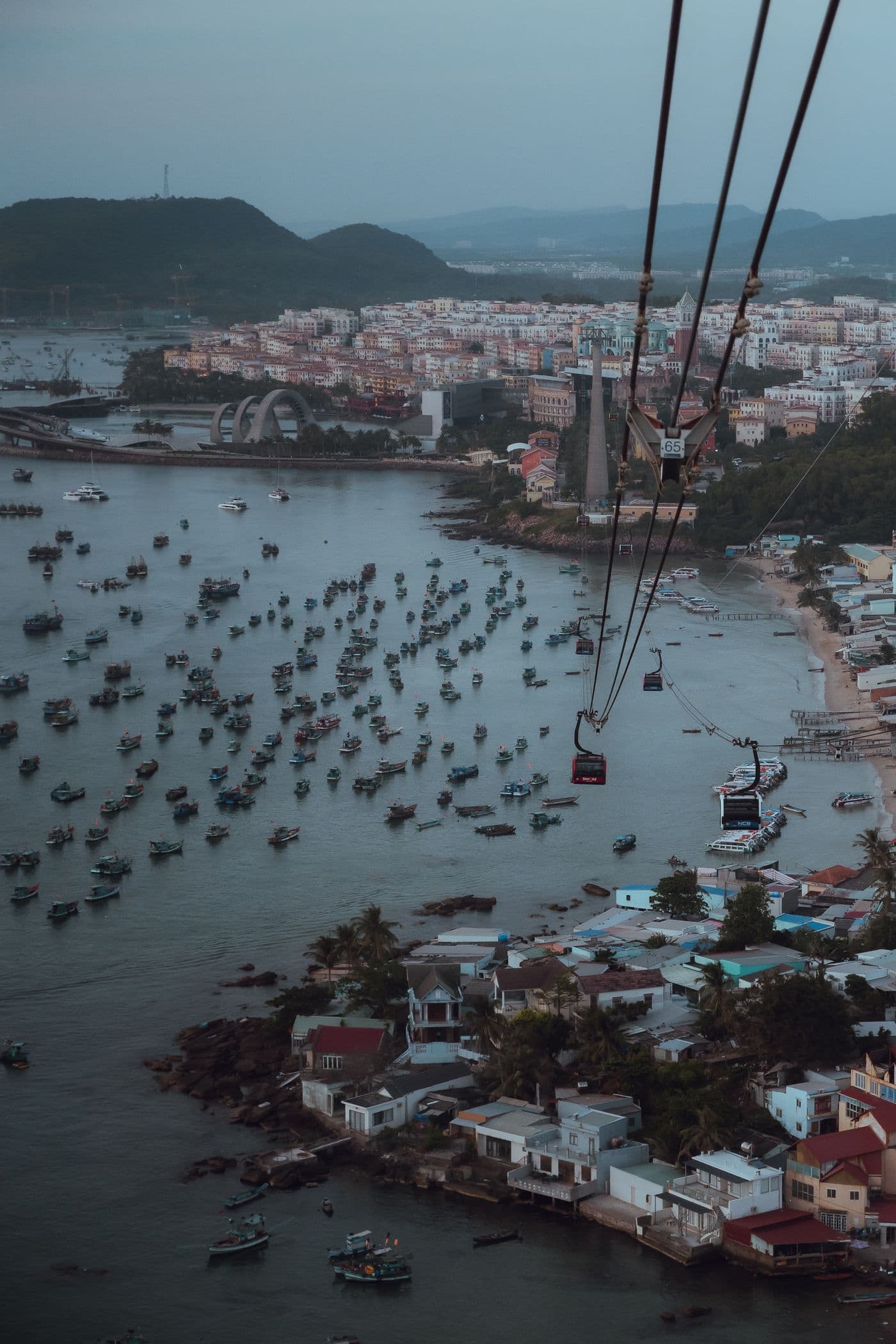Archive photograph of cable cars above Phu Quoc’s coast and harbour, not a live service or sea-condition report