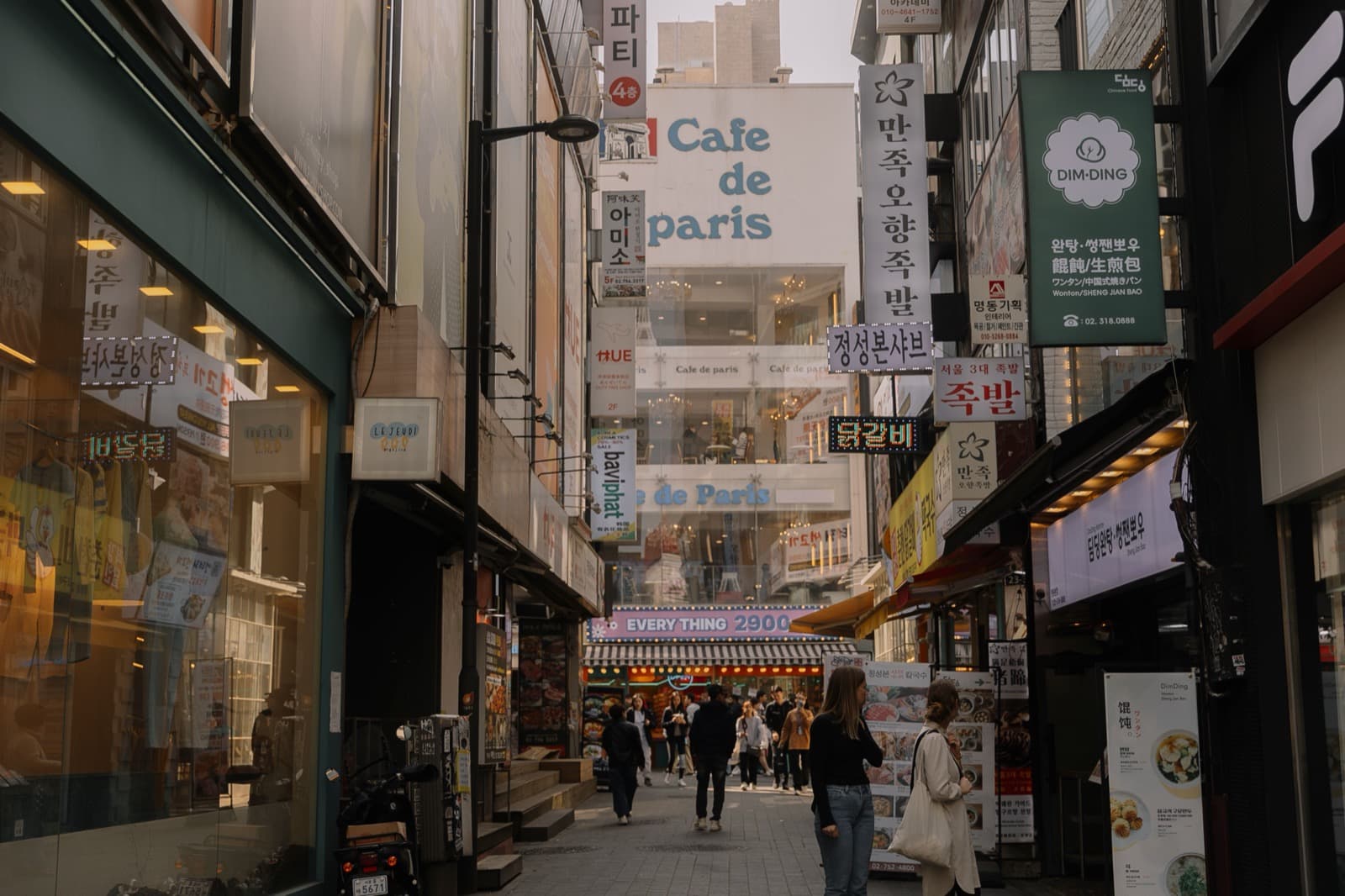 Myeongdong's shopping street lined with store signs